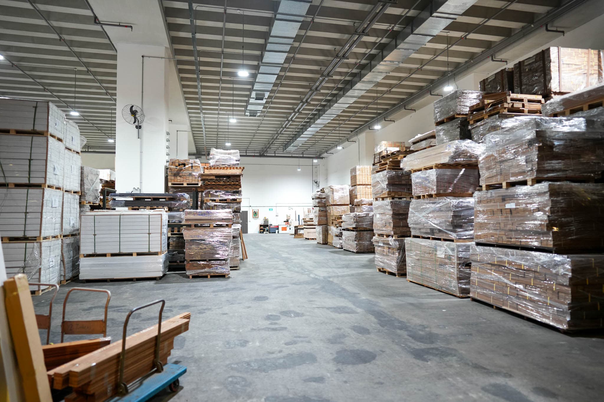 Wide view of YZ Timber warehouse floor and timber inventory